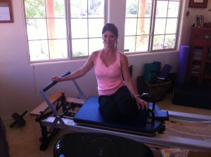 Dawn seated on reformer